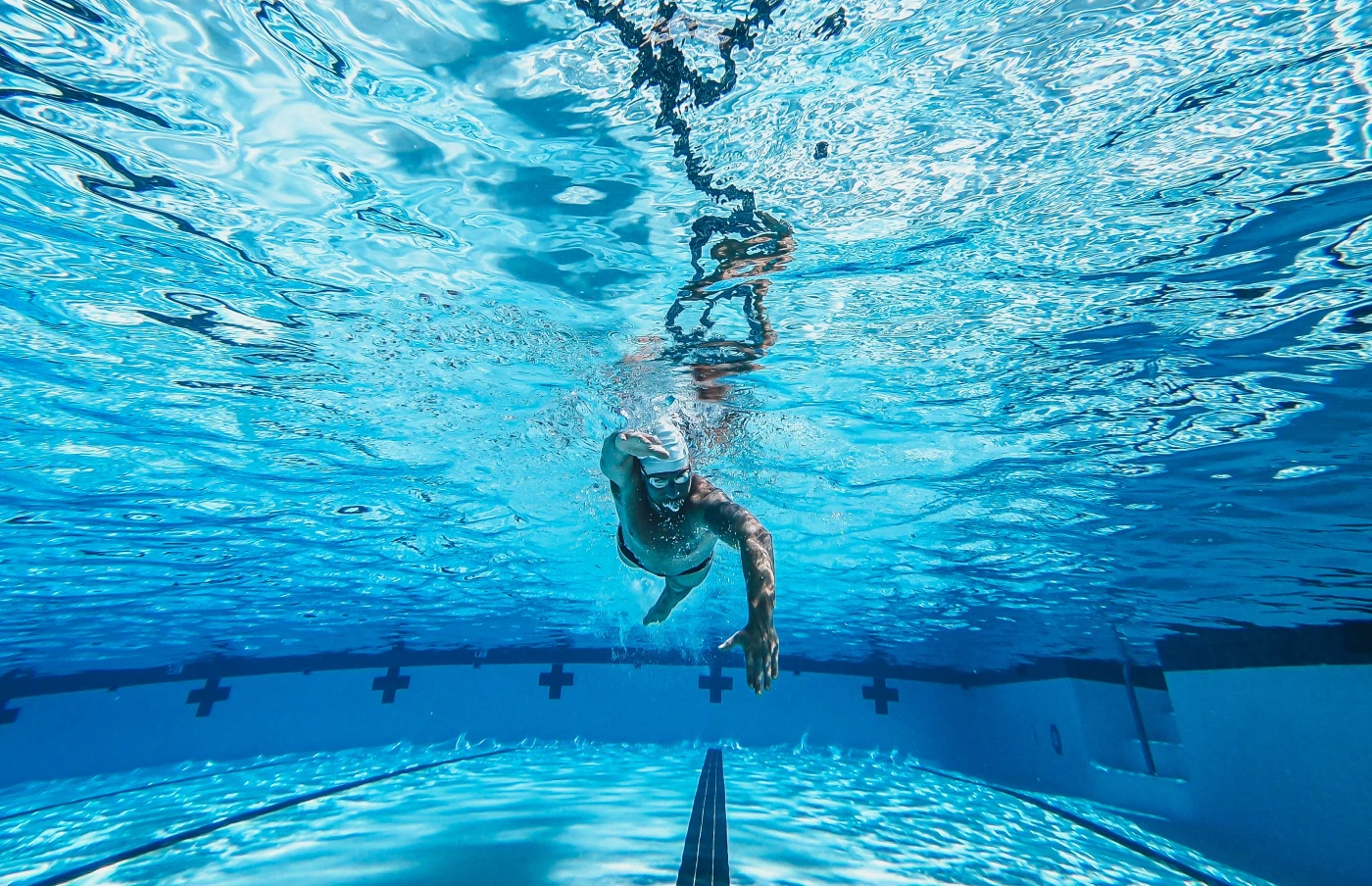Men swimming in the pool